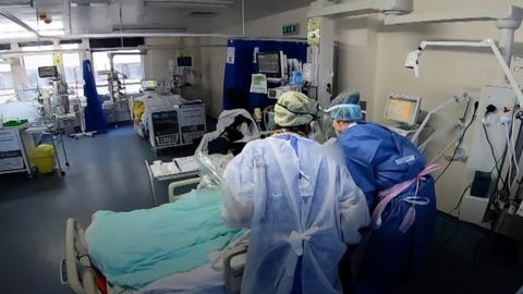 NHS staff treating coronavirus patient