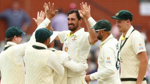 Australia celebrating Mitchell Starc's wicket