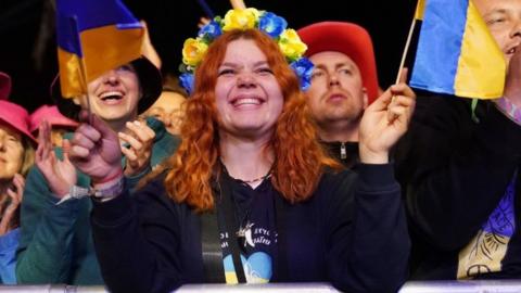 A fan watches Eurovision