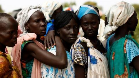 Women queue for food in the South Sudanese village of Rubkuai in Unity State, 16 February 2017