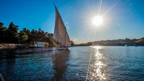 A picture taken on November 24, 2017 shows a felucca sailing down the Nile in the Egyptian city of Aswan, some 920 kilometres south of the capital Cairo.