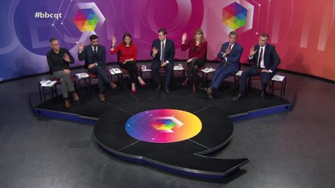 Question Time panel holding up their hands