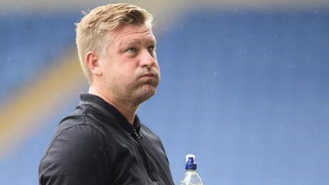 Oxford United manager Karl Robinson will watch his side from the stands this weekend after being handed a one game touchline ban.