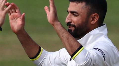 Zafar Gohar celebrates taking a wicket