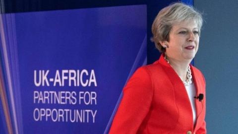 Theresa May about to address business leaders in Cape Town