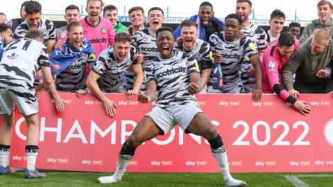 Forest Green Rovers celebrate promotion to League One as Ebou Adams of Forest Green Rovers celebrates in fron