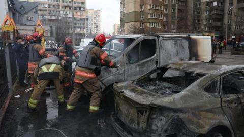 Emergency workers at the site of a Russian missile strike in Kyiv, Ukraine, on 9 March, 2023