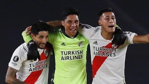 Enzo Perez (centre) celebrates with River Plate team-mates after a win over Independiente