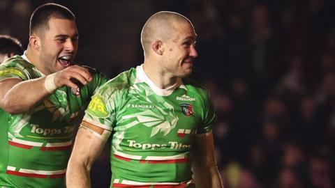 Mike Brown smiles after scoring a try for Leicester against former side Harlequins