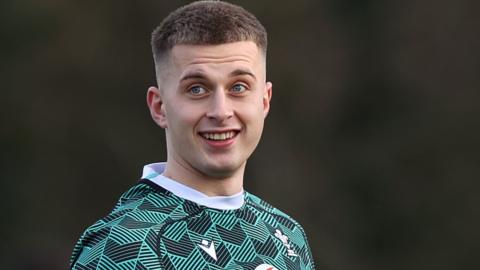 Cameron Winnett looks relaxed in Wales training