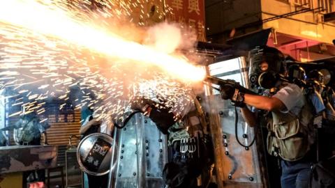 Police fire tear gas to clear pro-Democracy protesters in Hong Kong