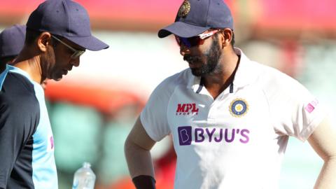 India fast bowler Jasprit Bumrah talks to team management on the boundary during day three of the third Test against Australia