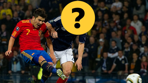 David Villa and a plyer obscured by a question mark graphic