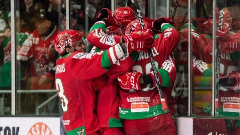 Devils players celebrate