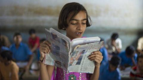 Indian girl reading aloud during English lesson at Rajyakaiya School in Narlai village, Rajasthan, Northern India (Photo by Tim Graham/Getty Images)