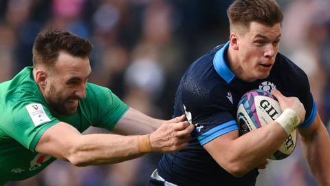 Huw Jones escapes Jack Conan