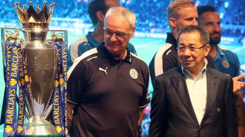 Then Leicester City boss Claudio Ranieri (left) and late owner Vichai Srivaddhanaprabha (right) look at the Premier League trophy after winning the title in 2016