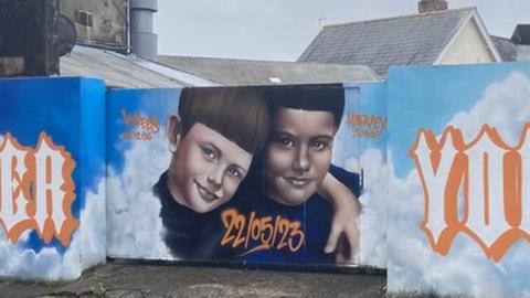 A mural for Kyrees Sullivan, 16, and Harvey Evans, 15