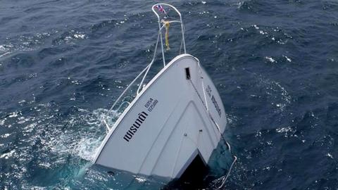 A tourist boat after it capsized off the coast in Phuket Island, southern Thailand