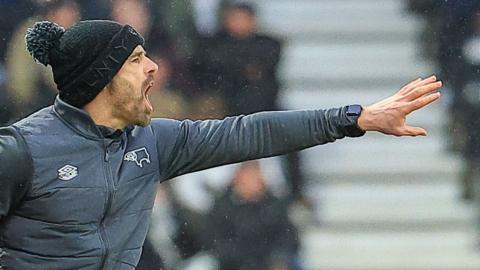 Paul Warne yells instructions to his Derby County players