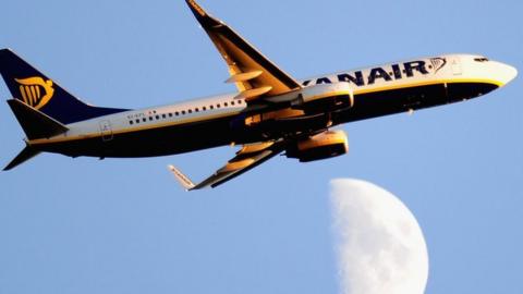 Ryanair flight leaves Stansted Airport on November 10, 2013