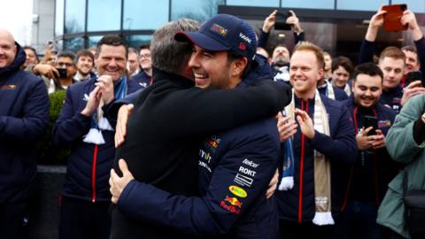 Sergio Perez and Christian Horner hugging