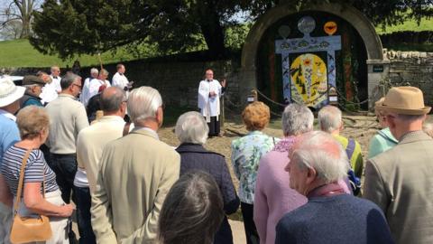 Clergy bless the wells