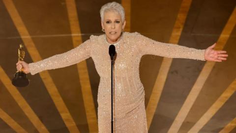 Jamie Lee Curtis accepting her Academy Award