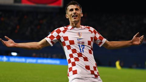 Croatia's Ante Budimir celebrates scoring against Armenia in a European Championship qualifier