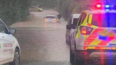 Flooded road near Blanefield