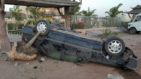 A car that overturned after speeding in The Gambia