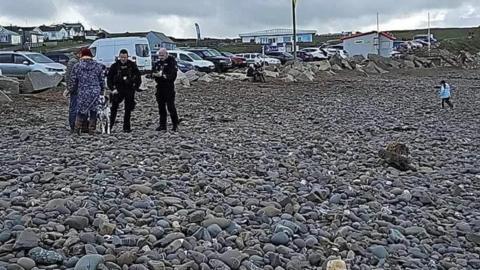 Police at Widemouth Bay