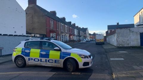 A police car parked on Sydenham Road, Hartlepool