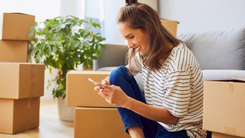 Young woman moving house