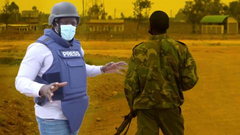Ferdinand Omondi and a security soldier