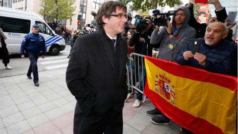 Dismissed Catalonia"s leader Carles Puigdemont arrives to address media representatives at The Press Club in Brussels on October 31, 2017.