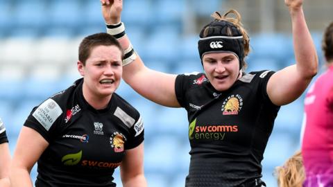 Exeter players celebrate a try