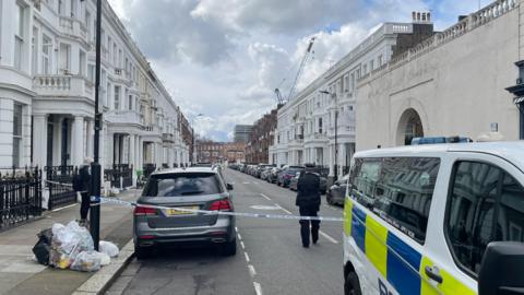 A crime scene is in place in Comeragh Road, West Kensington