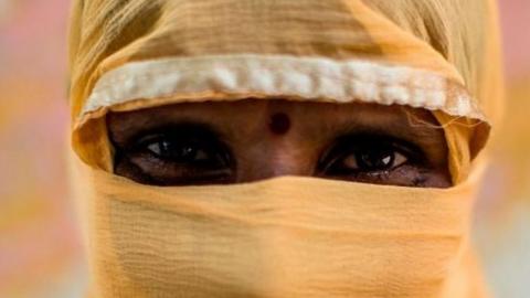 Accredited Social Health Activist (ASHA) worker Leelavati, 38, poses for a picture during an interview with AFP in Bahadarpur village in Meerut district.