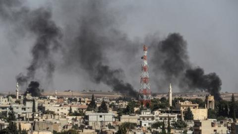 Smoke rises from inside Syria during bombardment by Turkish forces