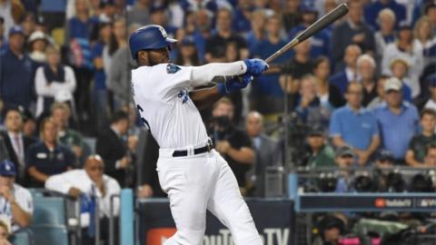 Los Angeles Dodgers outfielder Yasiel Puig swinging