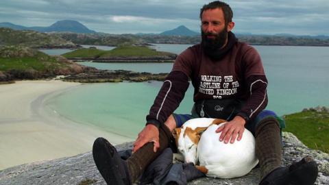 Christian Lewis and his dog Jet