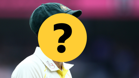 An Australia bowler with their face hidden by a question mark