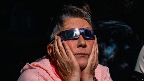 Person watching eclipse