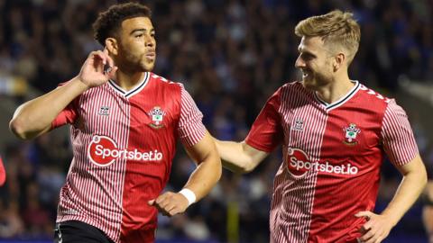 Southampton striker Che Adams (left) celebrates his goal