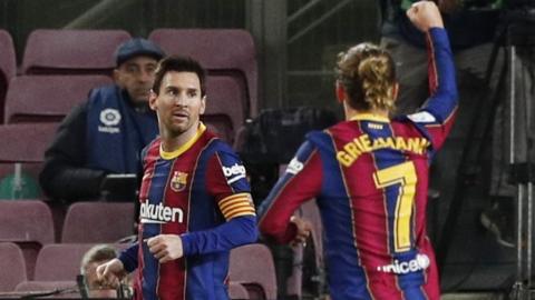 Lionel Messi celebrates scoring for Barcelona against Levante in La Liga