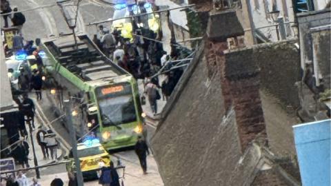 Police presence on Surrey Street, Croydon, following reports of a man suffering a stab injury in Fellmongers Yard,