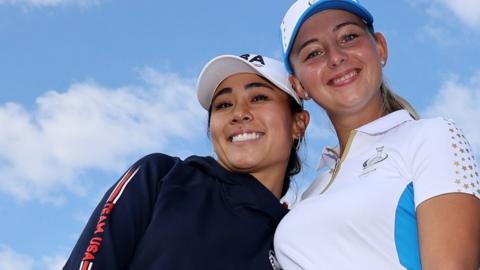 US player Danielle Kang poses for a photo with Emily Kristine Pedersen of Europe