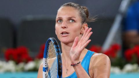 Karolina Pliskova applauds the crowd after beating Victoria Azarenka at the Madrid Open