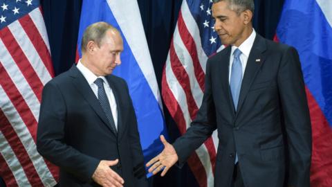 Putin and Obama shake hands at the UN on 28 September 2015